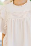 105224.Step-It-Up-Natural-White-Ruffled-Blouse__copy_4_074dbcf5-a833-4542-83a4-72df32ee0b30